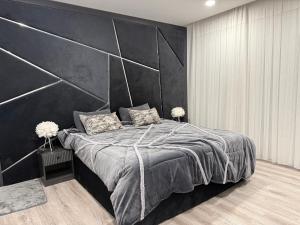 En eller flere senge i et værelse på Kahwnakan