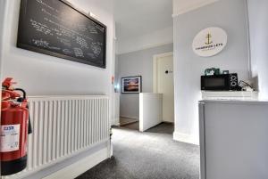 a room with a chalkboard on the wall at The Shore in Gourock
