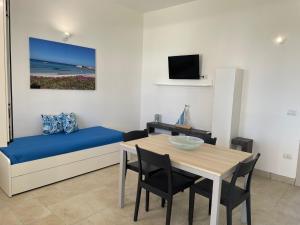 TV a/nebo společenská místnost v ubytování Agriturismo Le Paesane
