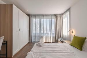 Postel nebo postele na pokoji v ubytování Top of the city + 62 fotografií