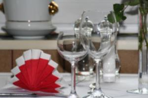 a group of wine glasses sitting on a table at Hotel-Restaurant Faehr-Cafe in Niesgrau +15 photos