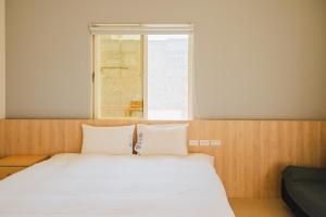 Llit o llits en una habitació de Blue Lagoon