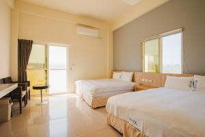 Llit o llits en una habitació de Blue Lagoon
