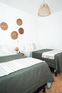 Postel nebo postele na pokoji v ubytování Central Hostel Pondicherry