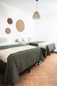 Postel nebo postele na pokoji v ubytování Central Hostel Pondicherry