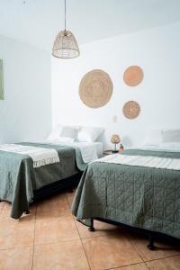 Postel nebo postele na pokoji v ubytování Central Hostel Pondicherry