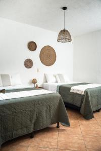 Postel nebo postele na pokoji v ubytování Central Hostel Pondicherry