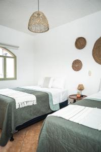Postel nebo postele na pokoji v ubytování Central Hostel Pondicherry