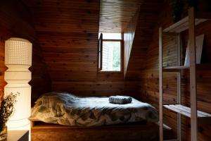 Posteľ alebo postele v izbe v ubytovaní Utopia Climbing Community