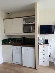 Η κουζίνα ή μικρή κουζίνα στο Corrèze rive Dordogne