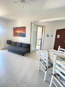 Area soggiorno di Mia House - Appartamento Marzamemi