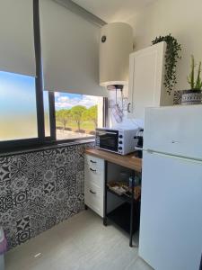 Cucina o angolo cottura di Mia House - Appartamento Marzamemi