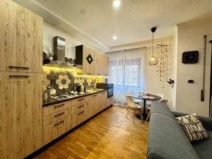 Η κουζίνα ή μικρή κουζίνα στο Sicily House Ostia +31 φωτογραφίες