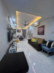 Гостиная зона в H&A Homestay Bandar Tasek Mutiara