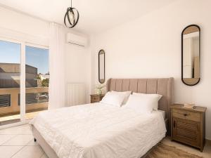 Ένα ή περισσότερα κρεβάτια σε δωμάτιο στο Chania sea view apartment - Crete