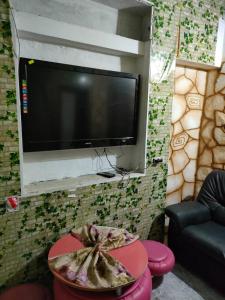 TV a/nebo společenská místnost v ubytování ksar el afia