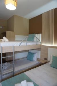 a room with two bunk beds in a room at House Michalis in Sarti +221 photos