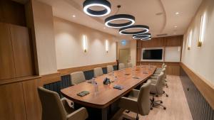 Οι επιχειρηματικές εγκαταστάσεις ή/και οι αίθουσες συνεδριάσεων στο Zind Naaba Appart Hôtel