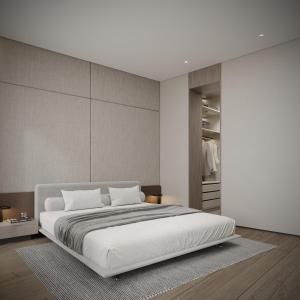 una camera da letto con un grande letto bianco e un armadio di Dukley Villa sea view a Budua Altre 23 foto