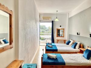 Postel nebo postele na pokoji v ubytování Eleana Apartments