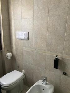 a small bathroom with a toilet and a sink at Villa Vinea Prisca B&B - Bergamo Hill in Cenate Sotto +91 photos
