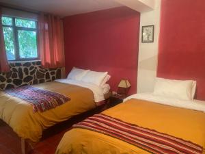 Letto o letti in una camera di Kiswar Lodg