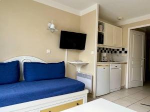 Kuchyň nebo kuchyňský kout v ubytování Au calme, appartement au cœur du Golf - Piscine