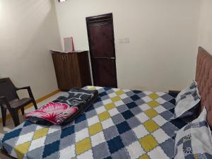 Letto o letti in una camera di Shree Dev Kripa Geust house