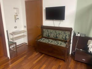 TV a/nebo společenská místnost v ubytování Villa Vinea Prisca B&B