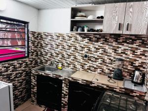 Kuchyň nebo kuchyňský kout v ubytování JULIA et SWEET HOME