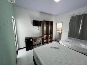 Postel nebo postele na pokoji v ubytování Hotel GAB RESIDENCIAL + 10 fotografií