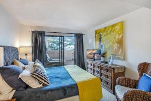 Ένα ή περισσότερα κρεβάτια σε δωμάτιο στο Bahia Vista B41