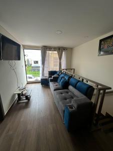 Μια τηλεόραση ή/και κέντρο ψυχαγωγίας στο Apartamento Ubate