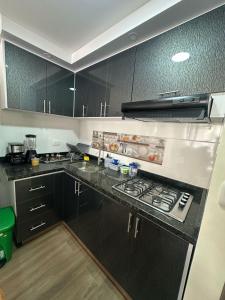 Η κουζίνα ή μικρή κουζίνα στο Apartamento Ubate