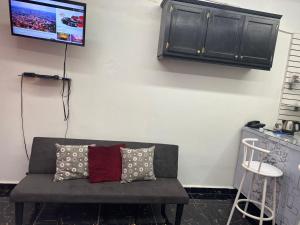 TV a/nebo společenská místnost v ubytování Divine Rest