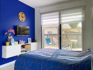 Postel nebo postele na pokoji v ubytování Studio La Fontaine cosy et climatisé 2 personnes