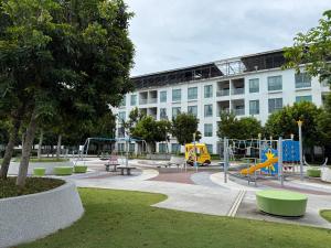 a playground in front of a building at The Loft Imago by LAXZONE in Kota Kinabalu