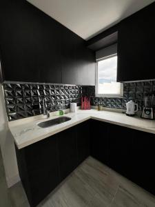 Фотография из галереи Apartamento PentHouse Vistas Espectaculares в городе Доскебрадас