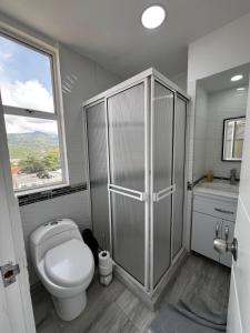 Фотография из галереи Apartamento PentHouse Vistas Espectaculares в городе Доскебрадас