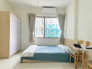 Voodi või voodid majutusasutuse Homely Hideout 501DT toas
