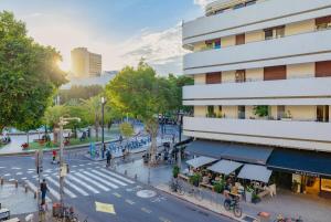an overhead view of a city street with a building at Elite Business Suite in Central TLV in Tel Aviv