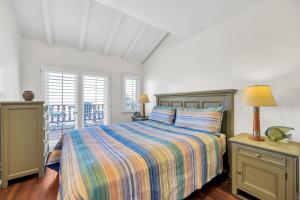 Ένα ή περισσότερα κρεβάτια σε δωμάτιο στο H157 - Hamilton Cove Villa 1-57 +24 φωτογραφίες