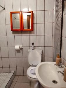 Et badeværelse på Aneiwa airport lodge + 48 billeder