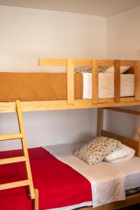 Ένα ή περισσότερα κρεβάτια σε δωμάτιο στο Temazcal Hostel