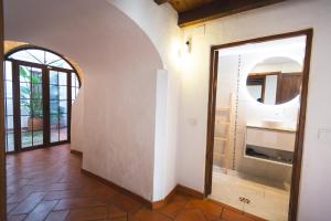 a bathroom with a sink and a mirror at Casa Arroyo de San Andrés in Córdoba +83 photos