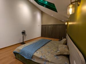 a bedroom with a bed in a room at CharDara Agrotourism & FarmStay in Mahabaleshwar