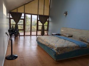 Postel nebo postele na pokoji v ubytování CharDara Agrotourism & FarmStay