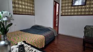 Voodi või voodid majutusasutuse BVC Hotel Iquique Cavancha toas
