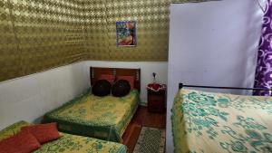 Voodi või voodid majutusasutuse BVC Hotel Iquique Cavancha toas
