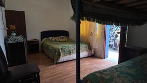 Voodi või voodid majutusasutuse BVC Hotel Iquique Cavancha toas